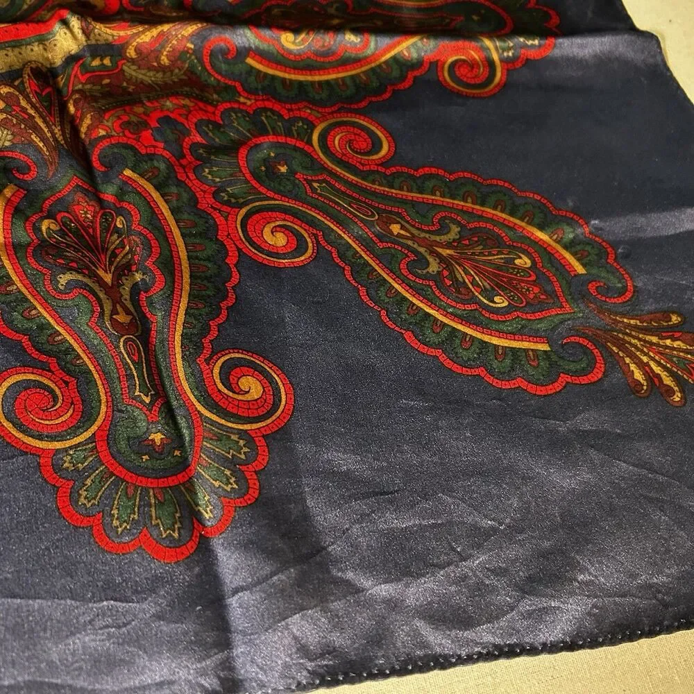 VTG Express silk scarf featuring a red and blue paisley pattern